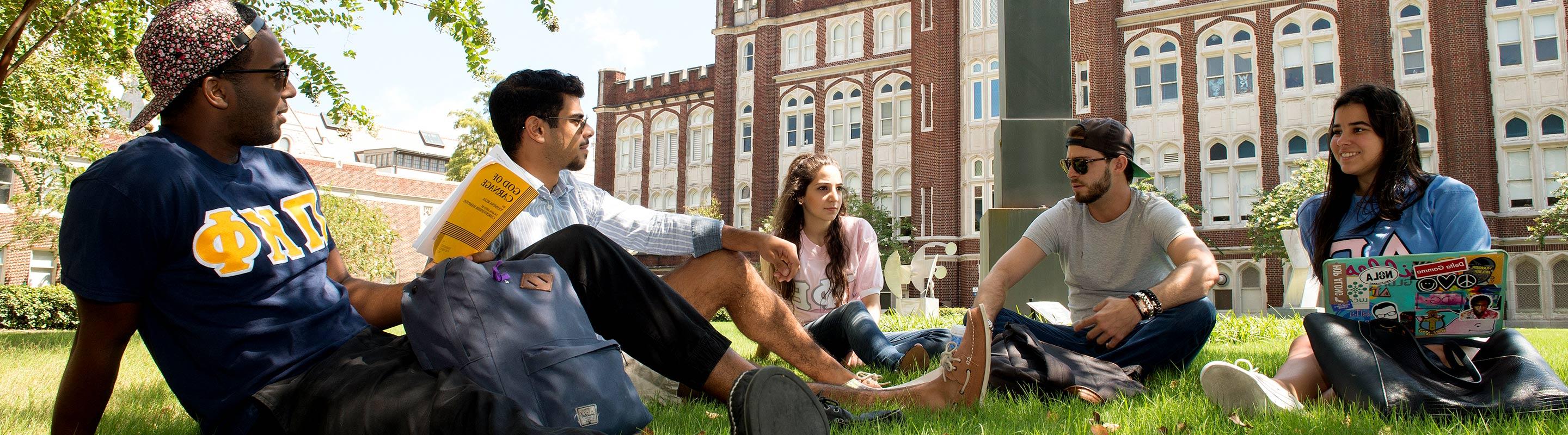 First-year students on lawn discussing